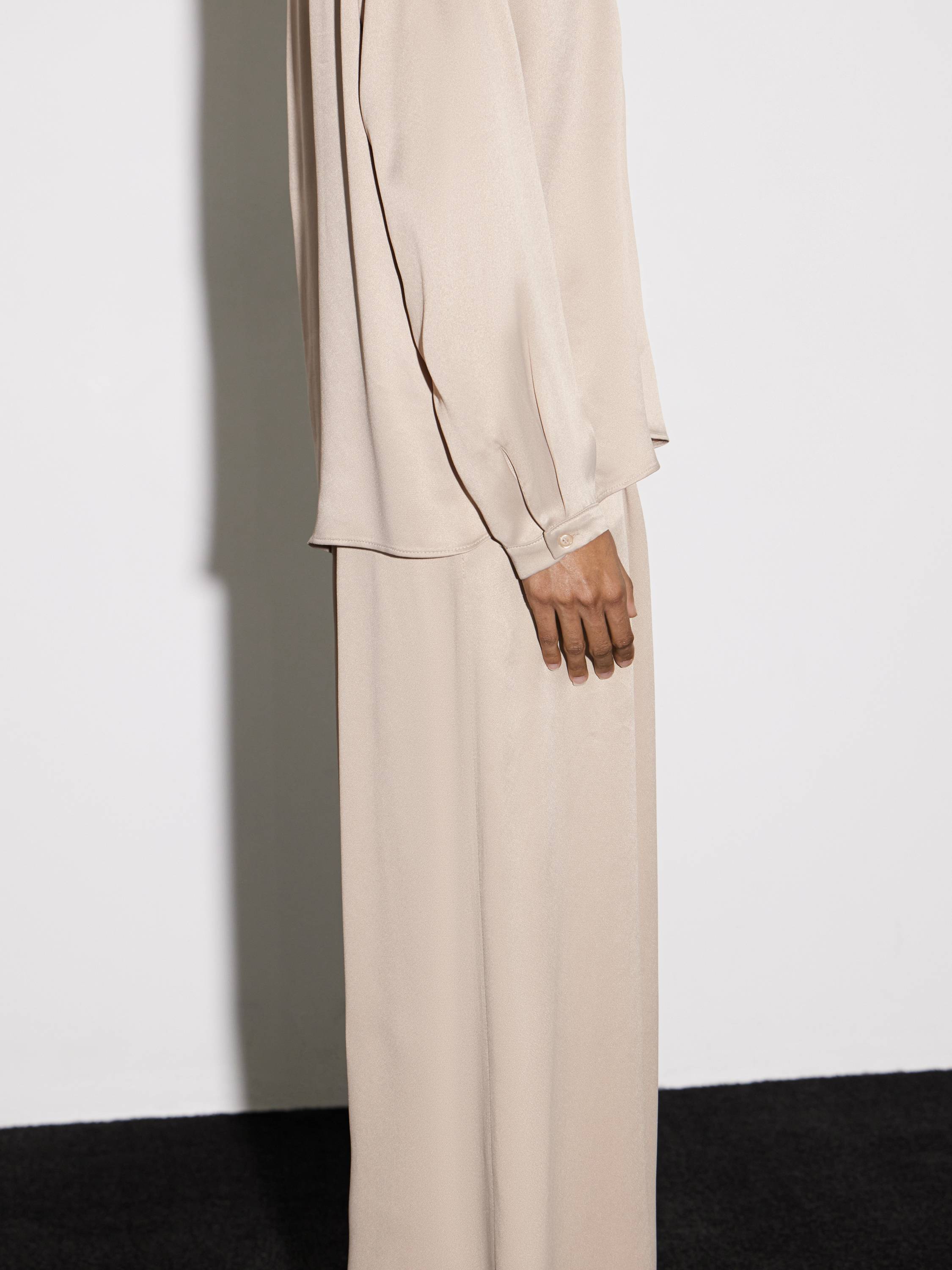 long-sleeve top and fluid throusers