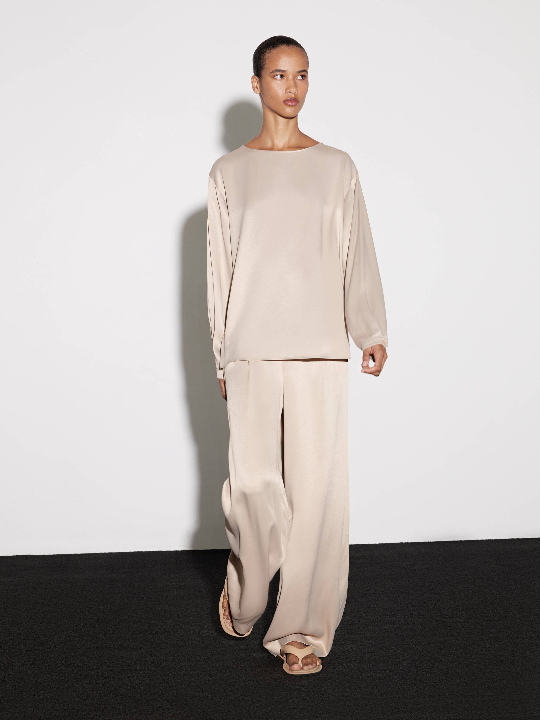 long-sleeve top and fluid throusers