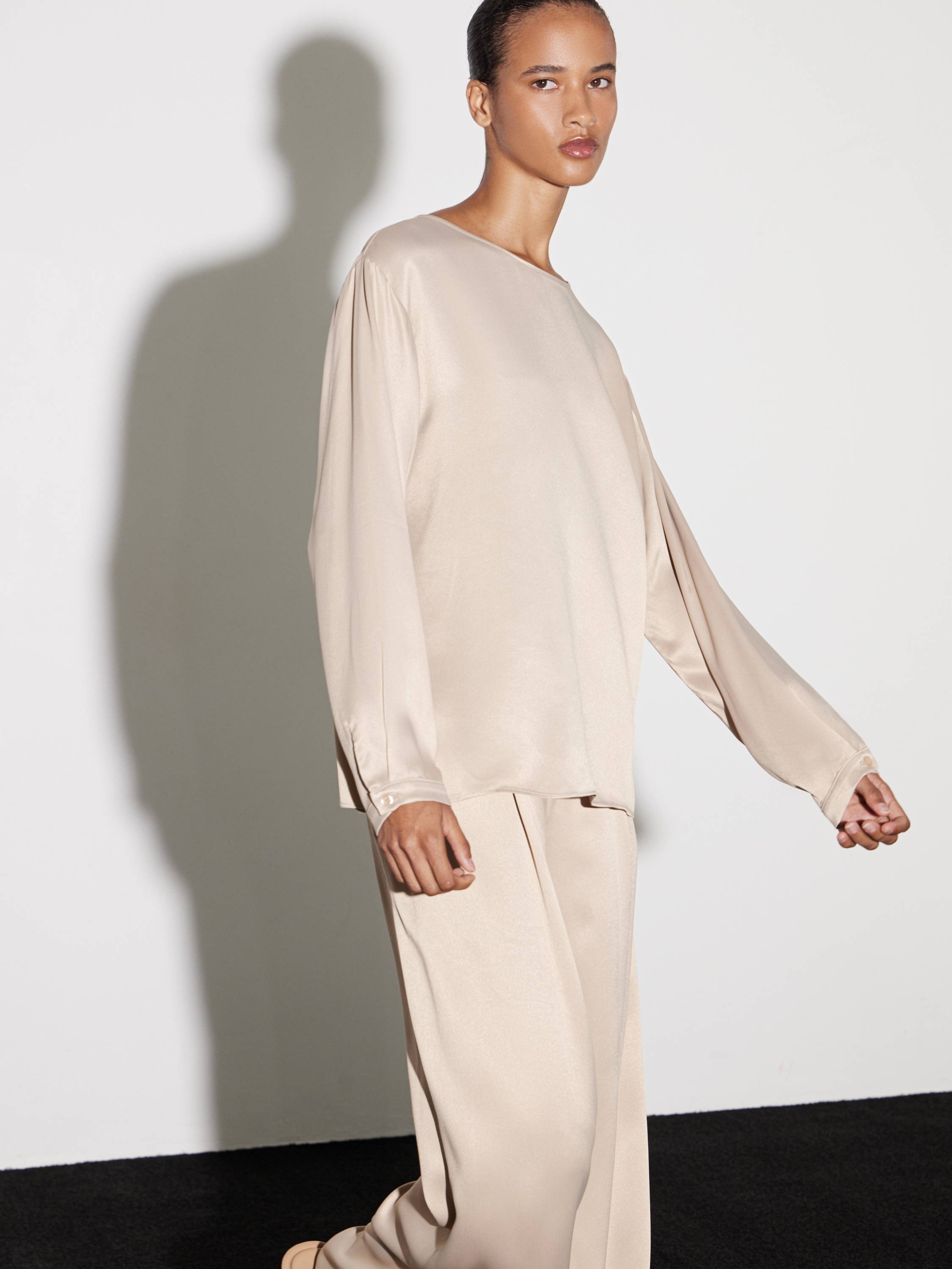 long-sleeve top and fluid throusers