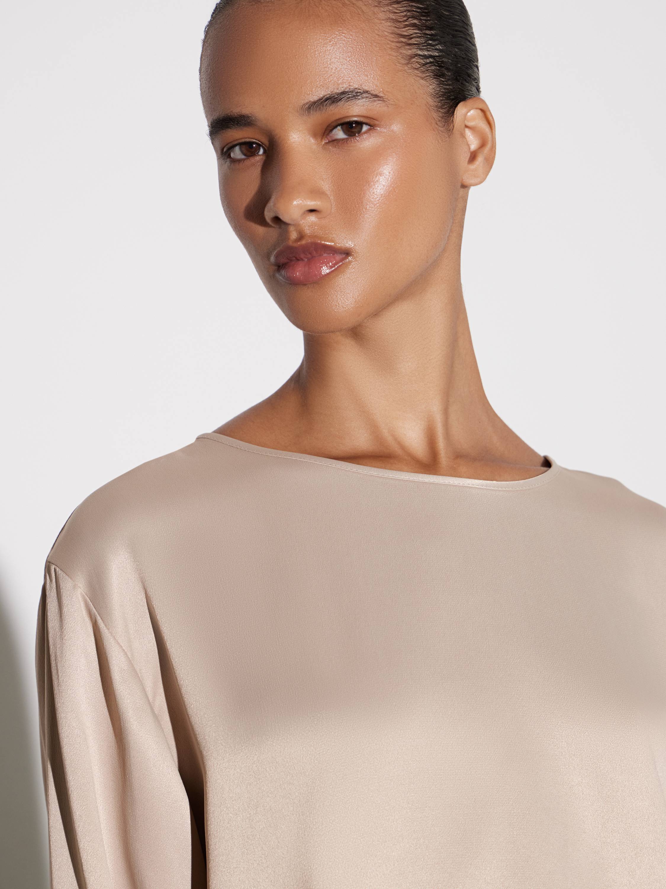 long-sleeve top and fluid throusers