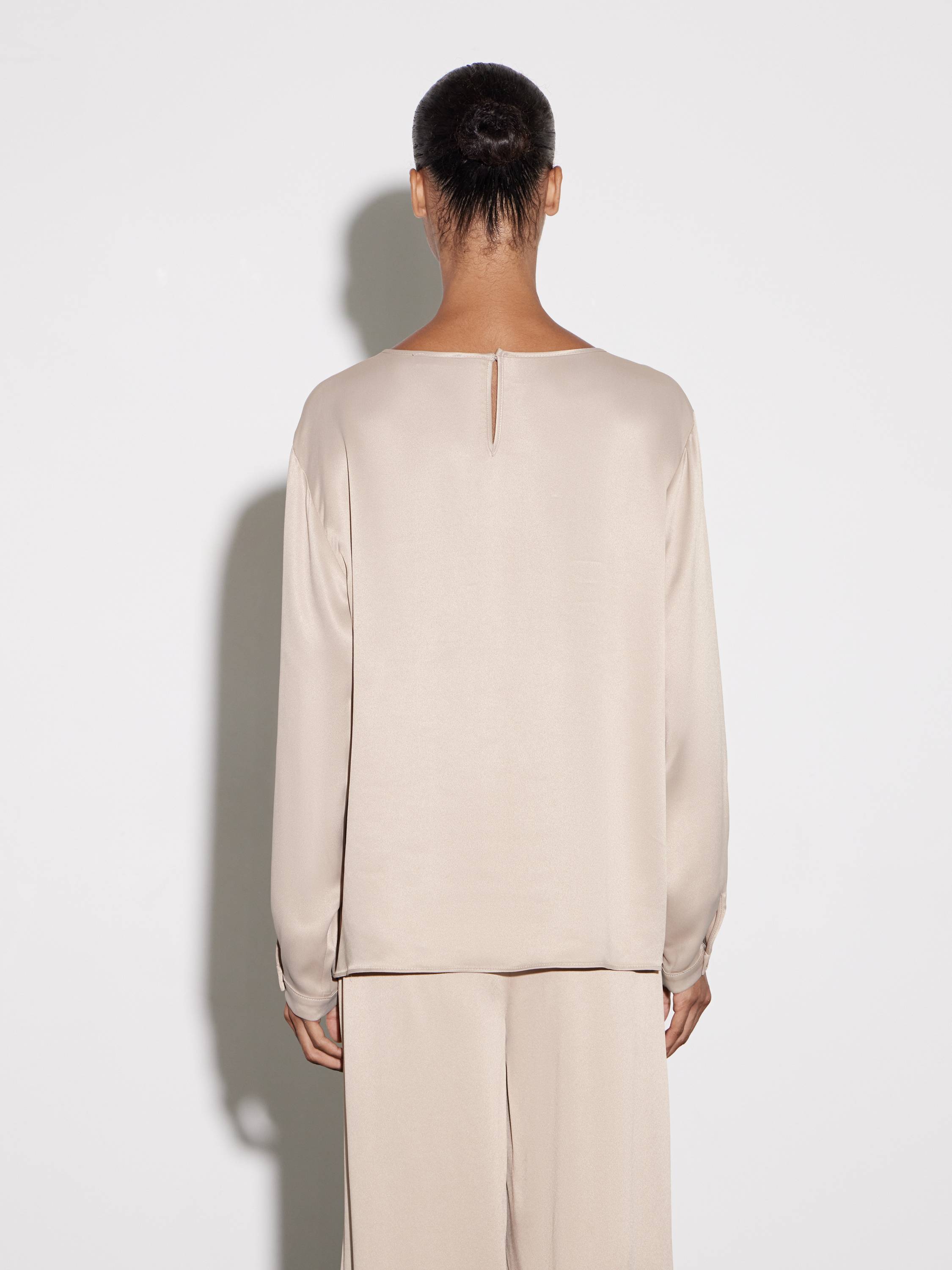 long-sleeve top and fluid throusers